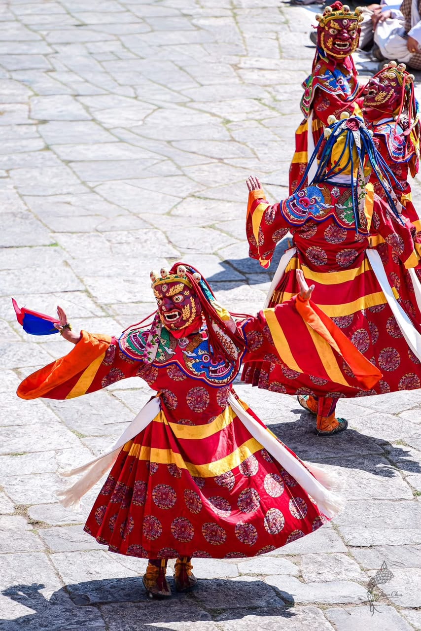 Pair of Red Cham Dancers