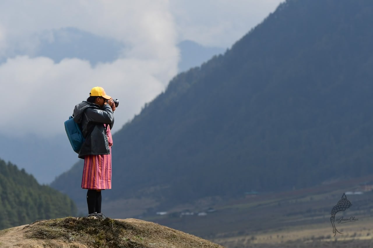 Bhutanese Guide with Mountain View